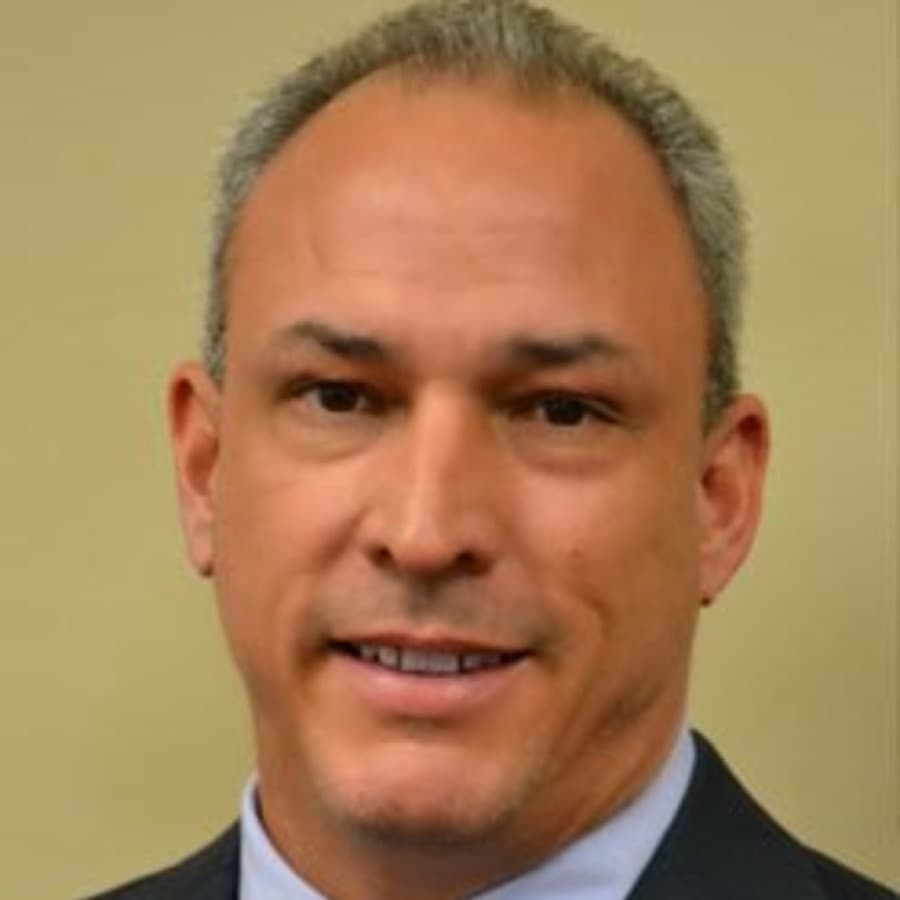Ray E. Santos, M.D.